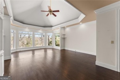 This stunning home is located in the prestigious gated section on The Golf Club of Georgia in Georgia - for sale on GolfHomes.com, golf home, golf lot