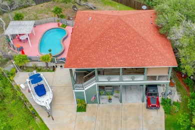 Check out this amazing home nestled in between two wooded lots on Corpus Christi Country Club Golf Course in Texas - for sale on GolfHomes.com, golf home, golf lot