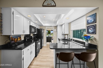 This beautifully maintained 2-bedroom, 2-bath home backs to on Ahwatukee Country Club in Arizona - for sale on GolfHomes.com, golf home, golf lot