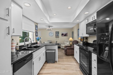This beautifully maintained 2-bedroom, 2-bath home backs to on Ahwatukee Country Club in Arizona - for sale on GolfHomes.com, golf home, golf lot