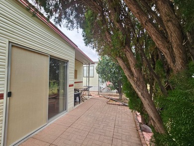 Come relax and enjoy stunning sunsets from your back patio on Viewpoint Golf Resort in Arizona - for sale on GolfHomes.com, golf home, golf lot