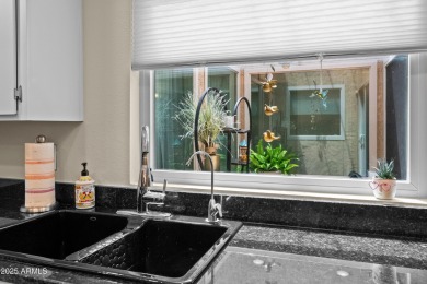 This beautifully maintained 2-bedroom, 2-bath home backs to on Ahwatukee Country Club in Arizona - for sale on GolfHomes.com, golf home, golf lot
