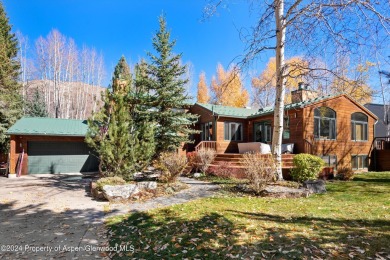 This beautiful 3,121 SF half duplex home which was remodeled in on Aspen Golf Club in Colorado - for sale on GolfHomes.com, golf home, golf lot