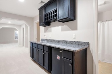 Located in the premier Brookstone Golf & Country Club community on Brookstone Golf and Country Club in Georgia - for sale on GolfHomes.com, golf home, golf lot