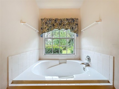 Under contract-accepting backup offers. Beautiful and Private on Plantation Golf Club in Florida - for sale on GolfHomes.com, golf home, golf lot