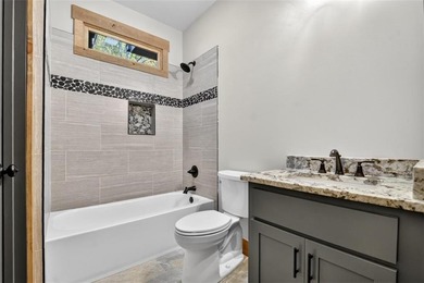 Overlooking a serene hidden lake-known by some residents as on White Path Golf Club in Georgia - for sale on GolfHomes.com, golf home, golf lot