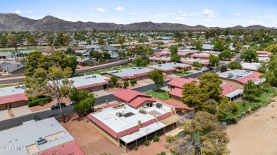 This beautifully maintained 2-bedroom, 2-bath home backs to on Ahwatukee Country Club in Arizona - for sale on GolfHomes.com, golf home, golf lot
