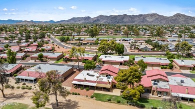This beautifully maintained 2-bedroom, 2-bath home backs to on Ahwatukee Country Club in Arizona - for sale on GolfHomes.com, golf home, golf lot