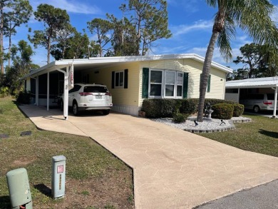 This lovely, manufactured home is in Lake Fairways Country Club on Pine Lakes Country Club in Florida - for sale on GolfHomes.com, golf home, golf lot