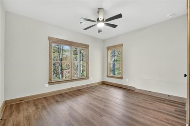 Overlooking a serene hidden lake-known by some residents as on White Path Golf Club in Georgia - for sale on GolfHomes.com, golf home, golf lot