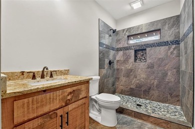 Overlooking a serene hidden lake-known by some residents as on White Path Golf Club in Georgia - for sale on GolfHomes.com, golf home, golf lot