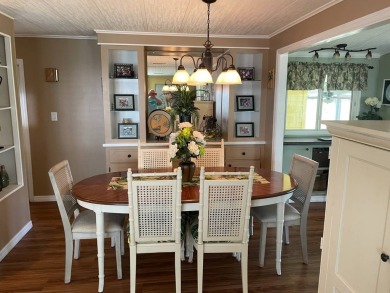 This lovely, manufactured home is in Lake Fairways Country Club on Pine Lakes Country Club in Florida - for sale on GolfHomes.com, golf home, golf lot