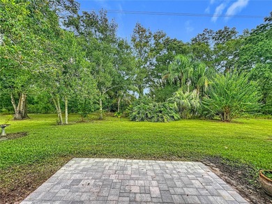 Under contract-accepting backup offers. Beautiful and Private on Plantation Golf Club in Florida - for sale on GolfHomes.com, golf home, golf lot