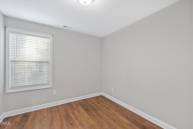 Tucked inside the gated community of Carolina Trace, this on Carolina Trace Country Club in North Carolina - for sale on GolfHomes.com, golf home, golf lot