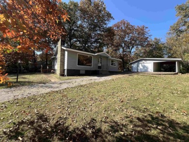 Charming and move-in ready, this beautifully updated 2-bedroom on Cherokee Village North Course in Arkansas - for sale on GolfHomes.com, golf home, golf lot