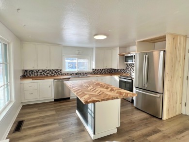 Freshly remodeled 3 Bedroom Whitefish home in a terrific on Whitefish Lake Golf Club in Montana - for sale on GolfHomes.com, golf home, golf lot