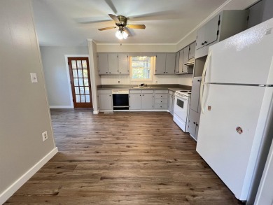 Charming and move-in ready, this beautifully updated 2-bedroom on Cherokee Village North Course in Arkansas - for sale on GolfHomes.com, golf home, golf lot