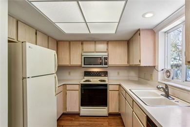 Charming End-Unit located within the exclusive gated *Reserve* on On Top Of The World Golf Course in Florida - for sale on GolfHomes.com, golf home, golf lot