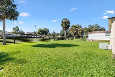 The beautiful weather is here, you should be too! This adorable on El Diablo Executive Golf Course in Florida - for sale on GolfHomes.com, golf home, golf lot