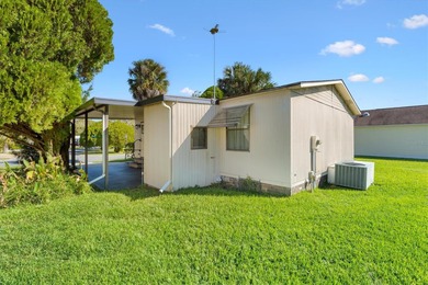 The beautiful weather is here, you should be too! This adorable on El Diablo Executive Golf Course in Florida - for sale on GolfHomes.com, golf home, golf lot