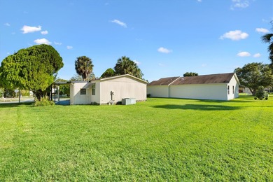 The beautiful weather is here, you should be too! This adorable on El Diablo Executive Golf Course in Florida - for sale on GolfHomes.com, golf home, golf lot
