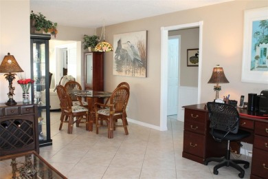 Welcome to this stunning and updated Baldwin model home on Mainlands Golf Club in Florida - for sale on GolfHomes.com, golf home, golf lot