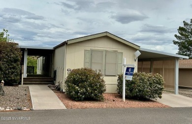 Nestled among the pines, this charming 2-bedroom, 2-bath home on Pine Shadows Golf Course in Arizona - for sale on GolfHomes.com, golf home, golf lot