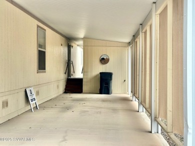 Nestled among the pines, this charming 2-bedroom, 2-bath home on Pine Shadows Golf Course in Arizona - for sale on GolfHomes.com, golf home, golf lot