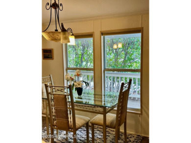 Nestled among the pines, this charming 2-bedroom, 2-bath home on Pine Shadows Golf Course in Arizona - for sale on GolfHomes.com, golf home, golf lot