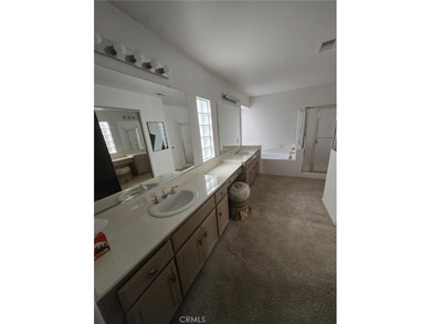 Enjoy one of the most beautiful entertainer's homes in Sun Lakes on Sun Lakes Country Club in California - for sale on GolfHomes.com, golf home, golf lot