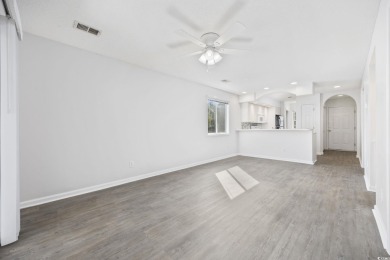 Discover this charming first-floor, end-unit condo located in on  in South Carolina - for sale on GolfHomes.com, golf home, golf lot