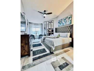 EXQUISITE TOP FLOOR LUXURY GATED CONDO IN THE HEART OF GULF on Craft Farms - Cypress Bend in Alabama - for sale on GolfHomes.com, golf home, golf lot