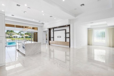 Beautifully renovated single story home available in Ballenisles on BallenIsles Golf and Country Club in Florida - for sale on GolfHomes.com, golf home, golf lot