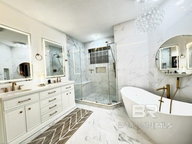 EXQUISITE TOP FLOOR LUXURY GATED CONDO IN THE HEART OF GULF on Craft Farms - Cypress Bend in Alabama - for sale on GolfHomes.com, golf home, golf lot