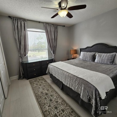 EXQUISITE TOP FLOOR LUXURY GATED CONDO IN THE HEART OF GULF on Craft Farms - Cypress Bend in Alabama - for sale on GolfHomes.com, golf home, golf lot