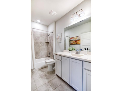 2313 Hyer Place, located in Melton Ridge, was built by Shaddock on WestRidge Golf Course in Texas - for sale on GolfHomes.com, golf home, golf lot