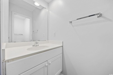 Discover this charming first-floor, end-unit condo located in on  in South Carolina - for sale on GolfHomes.com, golf home, golf lot