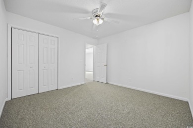 Discover this charming first-floor, end-unit condo located in on  in South Carolina - for sale on GolfHomes.com, golf home, golf lot