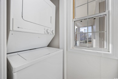Discover this charming first-floor, end-unit condo located in on  in South Carolina - for sale on GolfHomes.com, golf home, golf lot