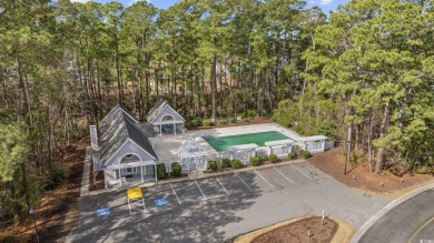 Discover this charming first-floor, end-unit condo located in on  in South Carolina - for sale on GolfHomes.com, golf home, golf lot