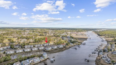 Discover this charming first-floor, end-unit condo located in on  in South Carolina - for sale on GolfHomes.com, golf home, golf lot