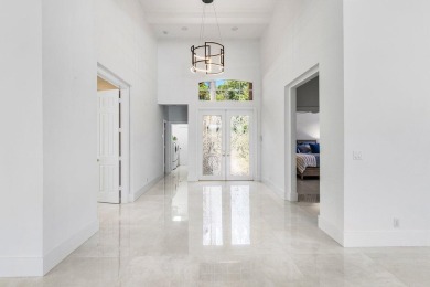Beautifully renovated single story home available in Ballenisles on BallenIsles Golf and Country Club in Florida - for sale on GolfHomes.com, golf home, golf lot