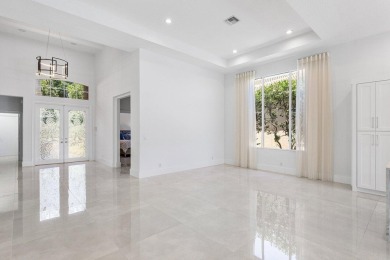 Beautifully renovated single story home available in Ballenisles on BallenIsles Golf and Country Club in Florida - for sale on GolfHomes.com, golf home, golf lot