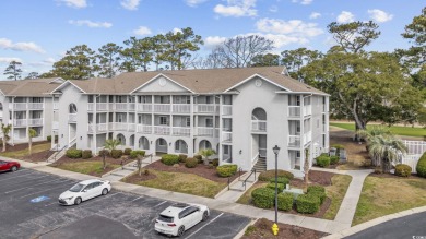 Discover this charming first-floor, end-unit condo located in on  in South Carolina - for sale on GolfHomes.com, golf home, golf lot