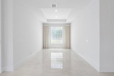 Beautifully renovated single story home available in Ballenisles on BallenIsles Golf and Country Club in Florida - for sale on GolfHomes.com, golf home, golf lot