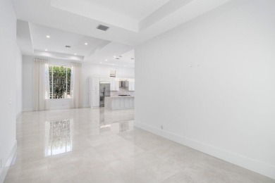 Beautifully renovated single story home available in Ballenisles on BallenIsles Golf and Country Club in Florida - for sale on GolfHomes.com, golf home, golf lot