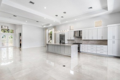 Beautifully renovated single story home available in Ballenisles on BallenIsles Golf and Country Club in Florida - for sale on GolfHomes.com, golf home, golf lot