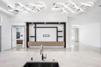 Beautifully renovated single story home available in Ballenisles on BallenIsles Golf and Country Club in Florida - for sale on GolfHomes.com, golf home, golf lot