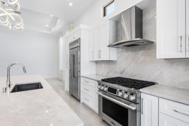 Beautifully renovated single story home available in Ballenisles on BallenIsles Golf and Country Club in Florida - for sale on GolfHomes.com, golf home, golf lot