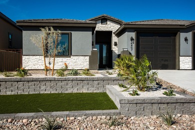Experience modern luxury and energy-efficient living in this on Los Lagos Golf Club in Arizona - for sale on GolfHomes.com, golf home, golf lot